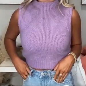 Never worn- mock neck sleeveless sweater